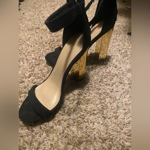 Black and gold heels